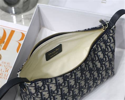 christian Dior oblique nomad bag